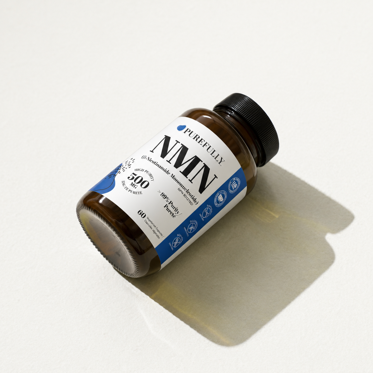 A bottle of PURGFULLY NMN dietary supplement, 500 mg, lying on its side on a clean white surface with a soft shadow cast to the right.